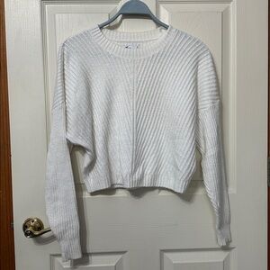 Hollister Co. Easy Cozy Ribbed Crew Sweater in creamy white.